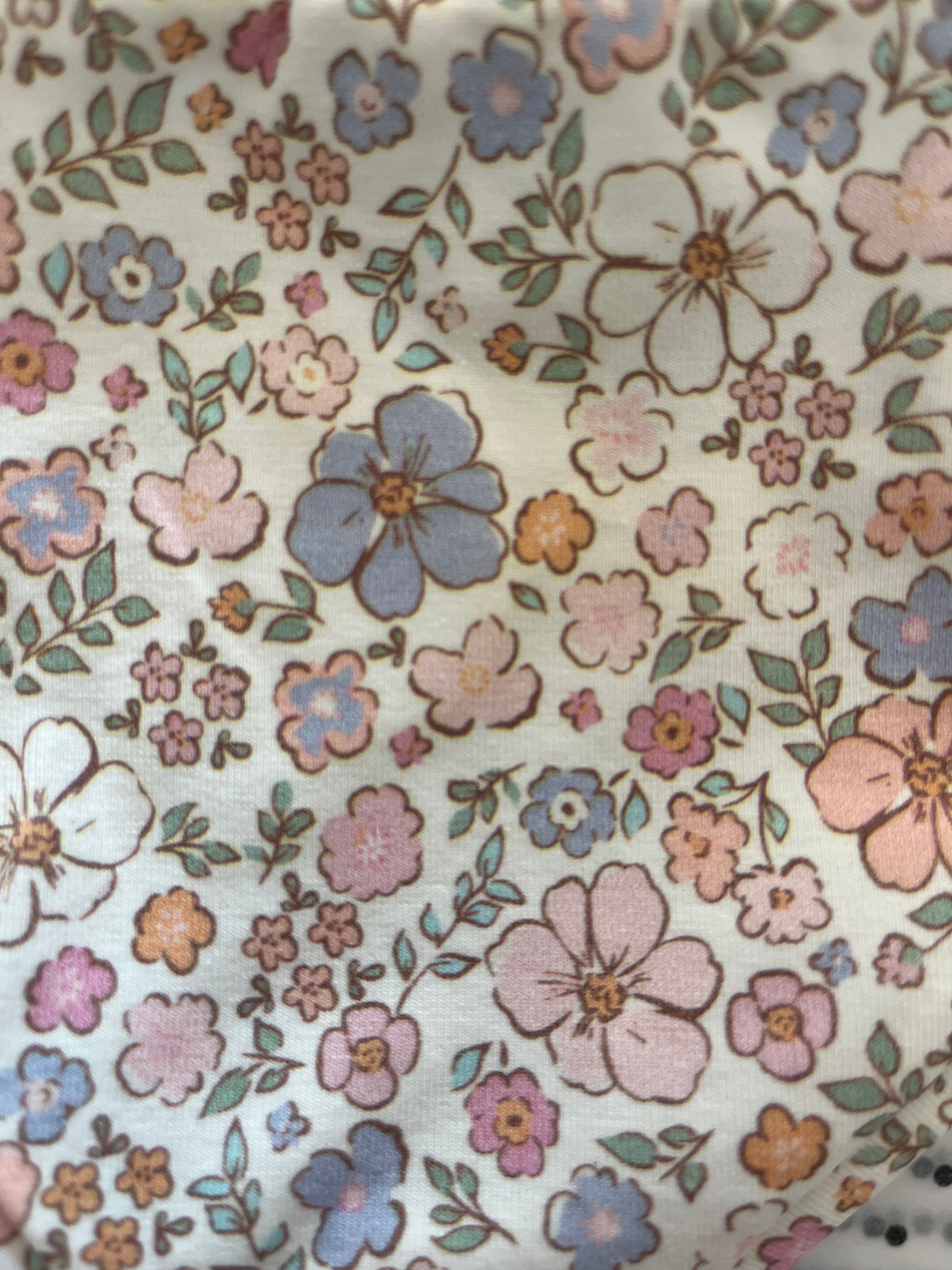 Dukkebody med blomster